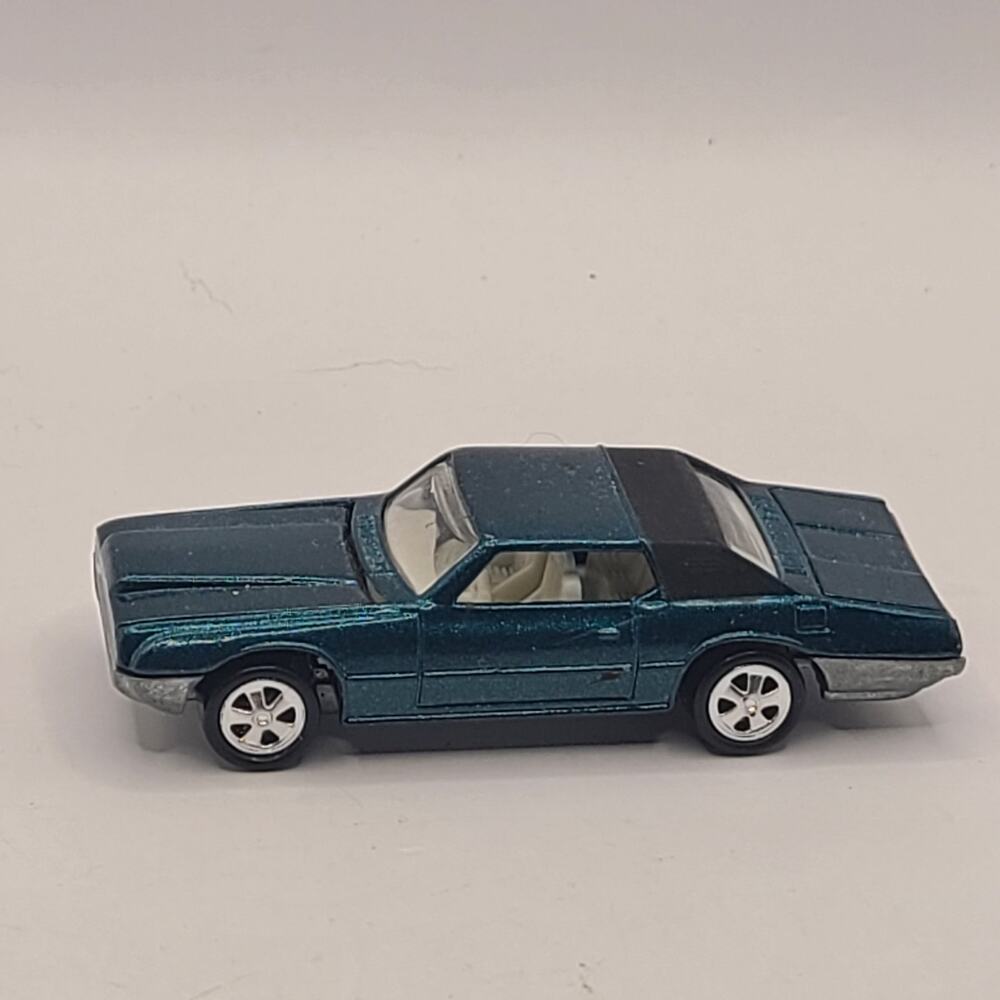 Johnny Lightning Aqua Custom Thunderbird 1/64 Scale Mint